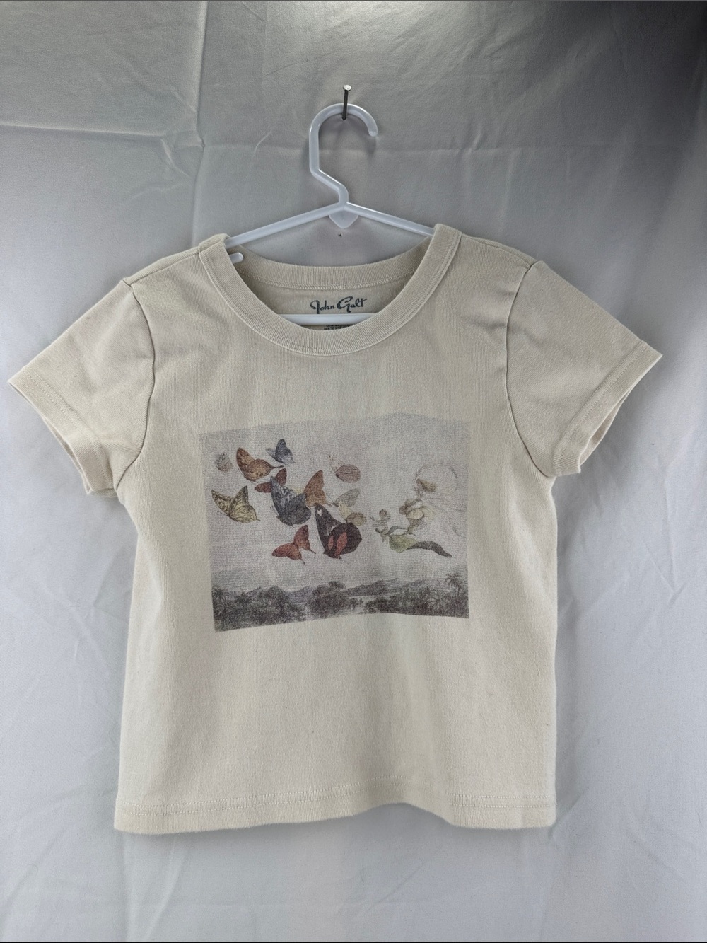 Brandy Melville John Galt Cotton Cream Short Sleeve Tee with Butterfly Graphic